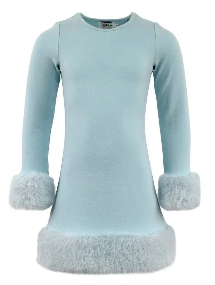 girl in a light blue dress with white fur trim by lola & the boys